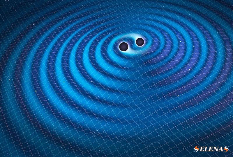 Столкновение двух черных дыр создает рябь в пространстве-времени, известную как «гравитационные волны».