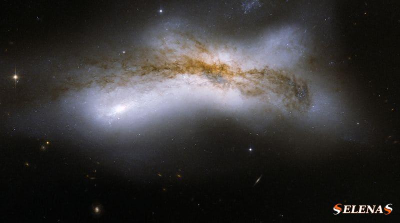 NGC 520 – сталкивающаяся галактика